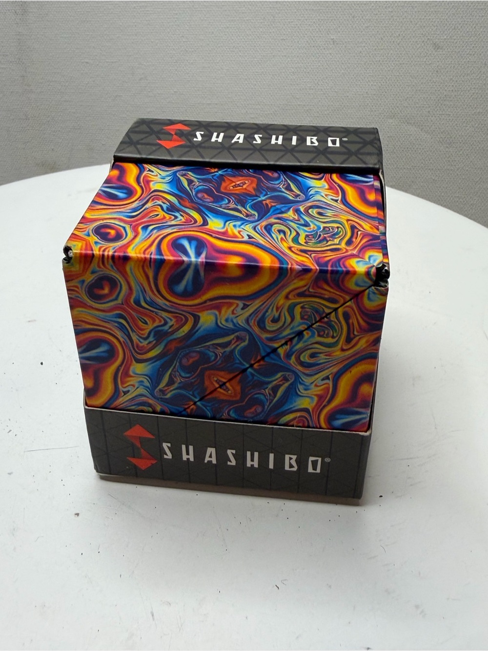 SHASHI Multicolor Swirl Magnetic Puzzle Box — Blue, Yellow, Red, Orange, Purple